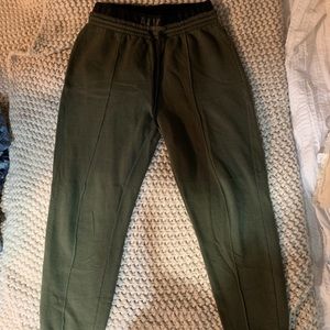 olive green vs pink joggers